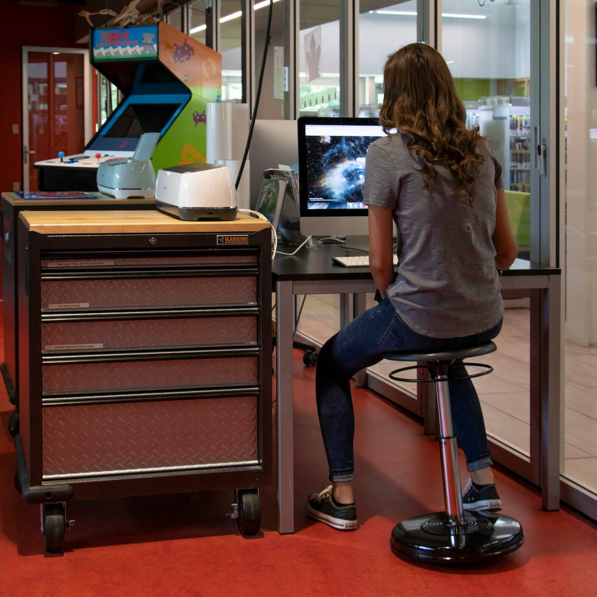 College Adjustable Black Wobble Chair in daily use