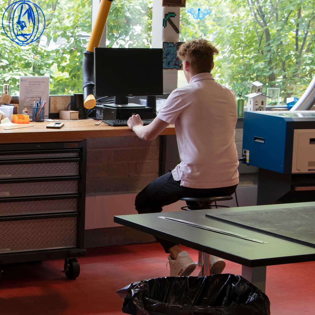 College Adjustable Black Wobble Chair in daily use