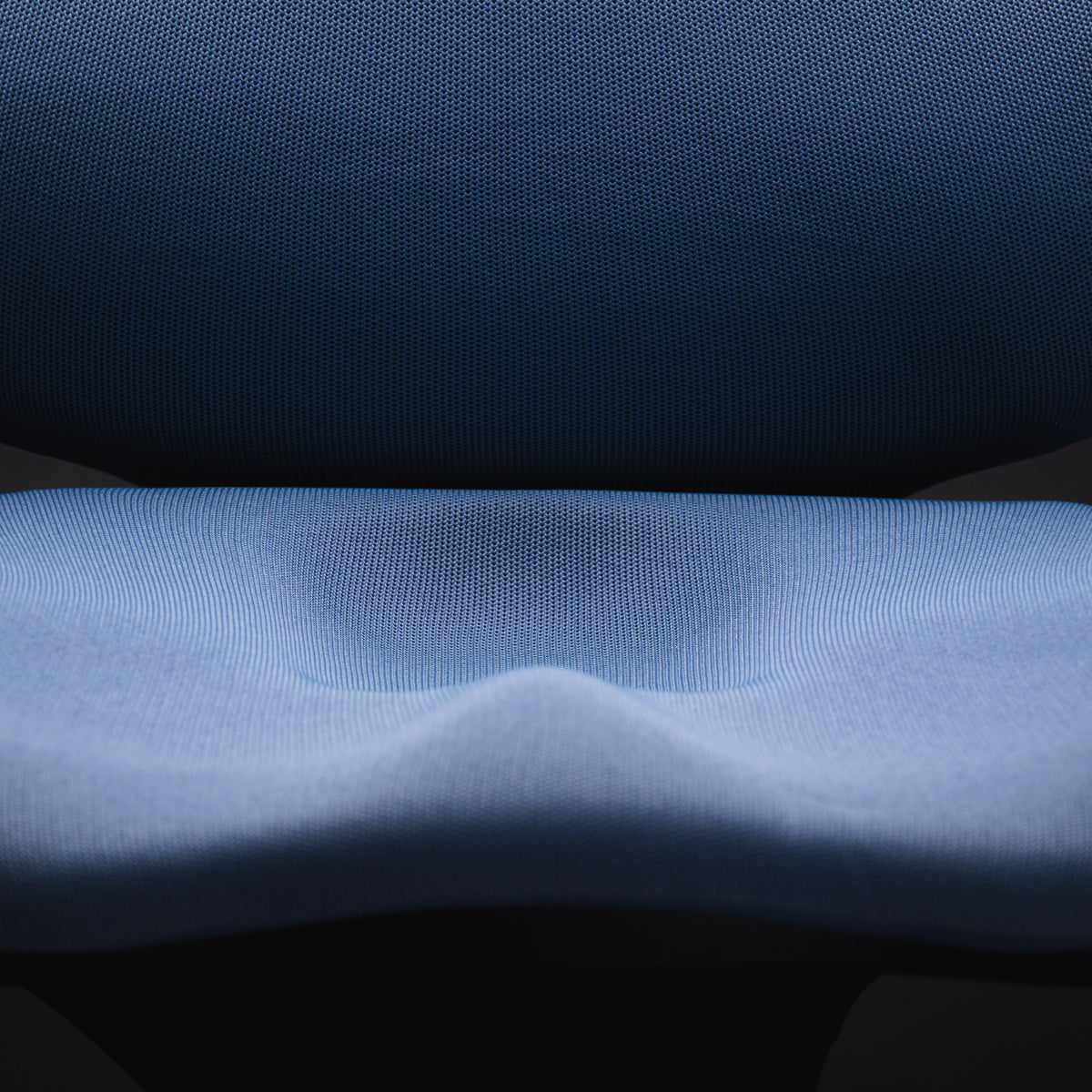 Close-up of the CoreChair Elite sculpted seat