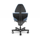 CoreChair Elite active sitting chair in Dusted Blue, rear view showing the Clever Spine back