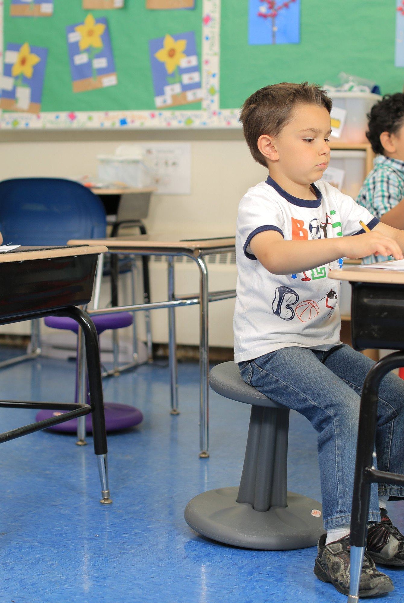 Kids using Kore Kids Wobble Chair 14" in classroom from Active Goods Canada