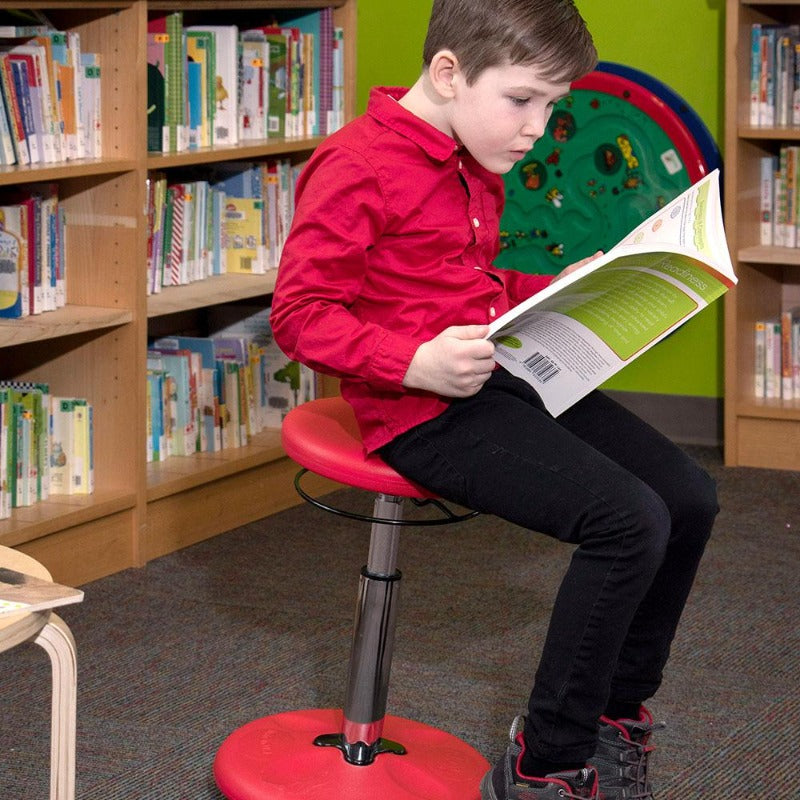 Kore Kids Adjustable Standard Wobble Chair for Active Sitting while reading from Active Goods Canada
